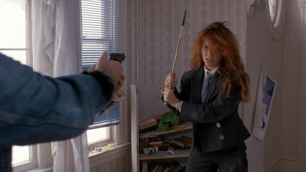 Linda channels her inner Malfeitor--three-piece suit and all--to go after Jim.