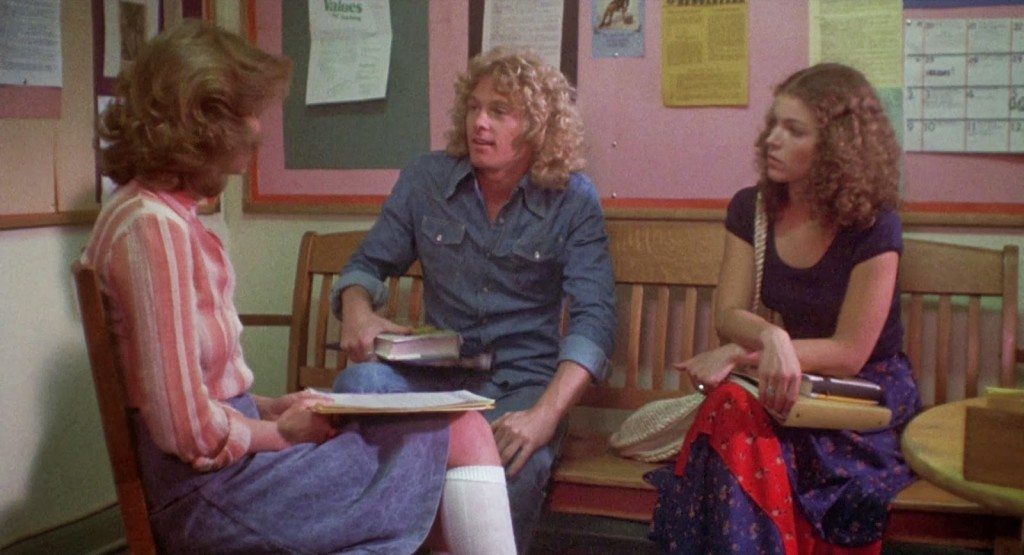 Sue and Tommy convince Miss Collins they have Carrie's best interest at heart; Tommy will be her prom date.