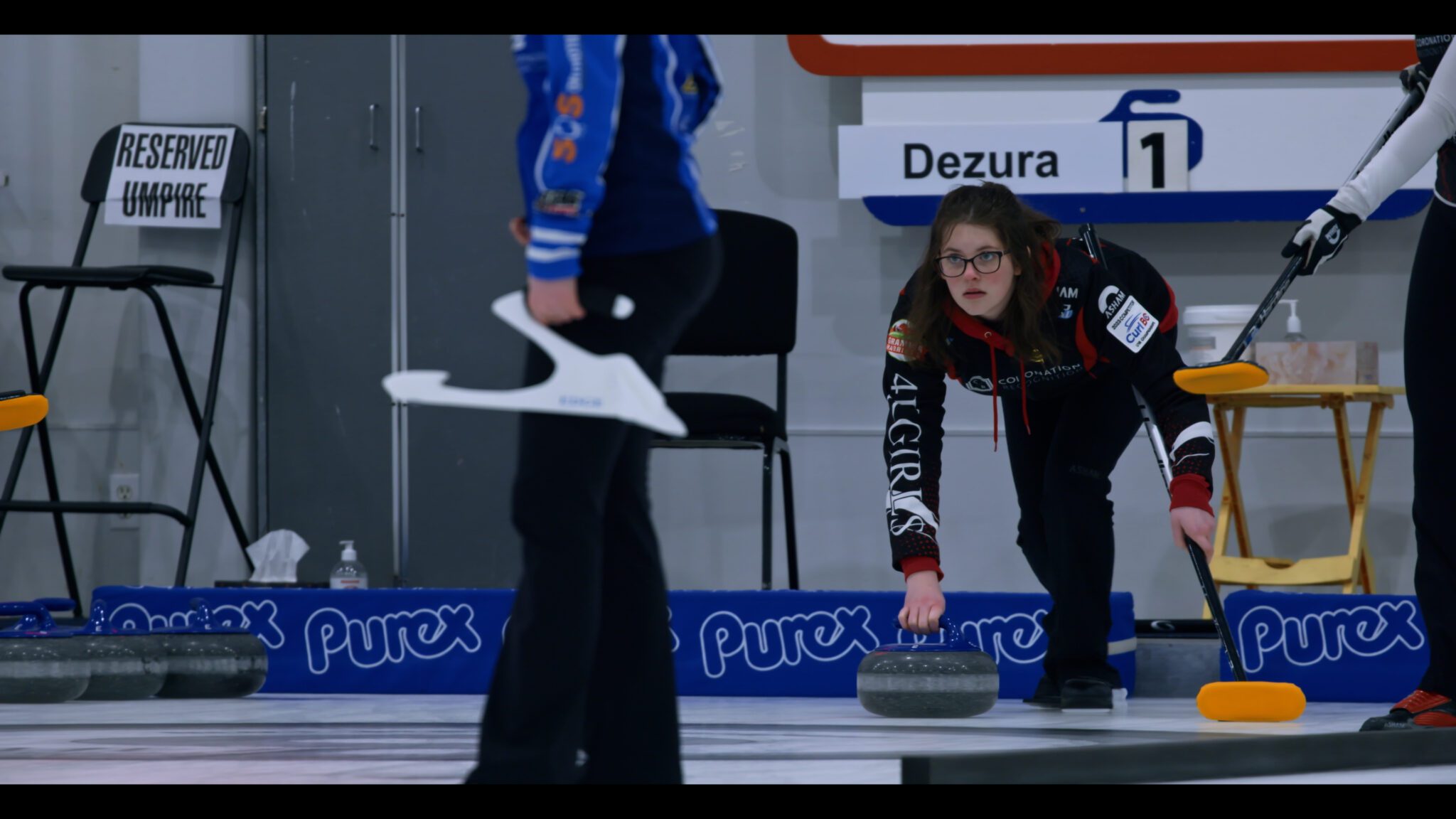 Curl Power: Anderson’s doc shows us the joy of passing the (Olympic) torch
